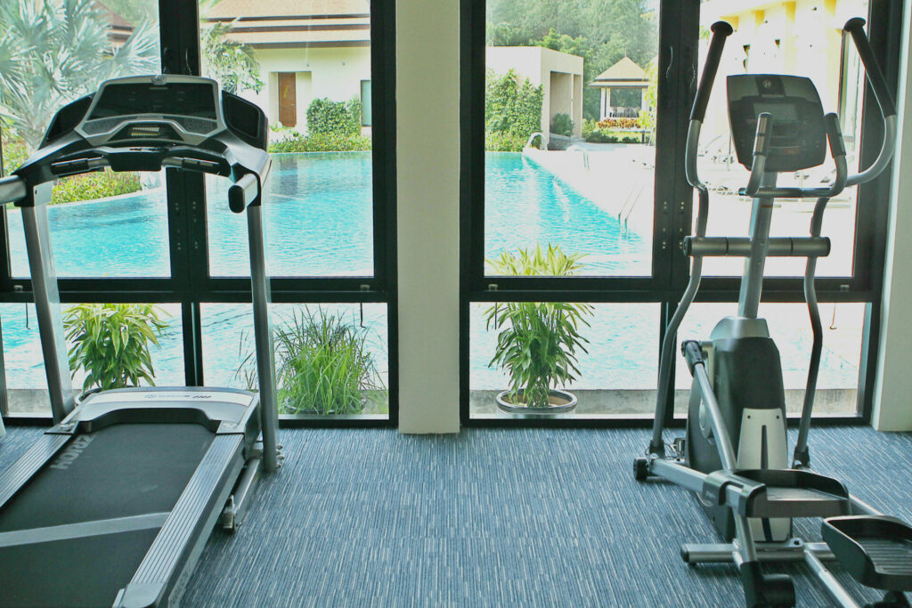 Soothing views at the main swimming pool from our private gym at Ataman Luxury Villas
