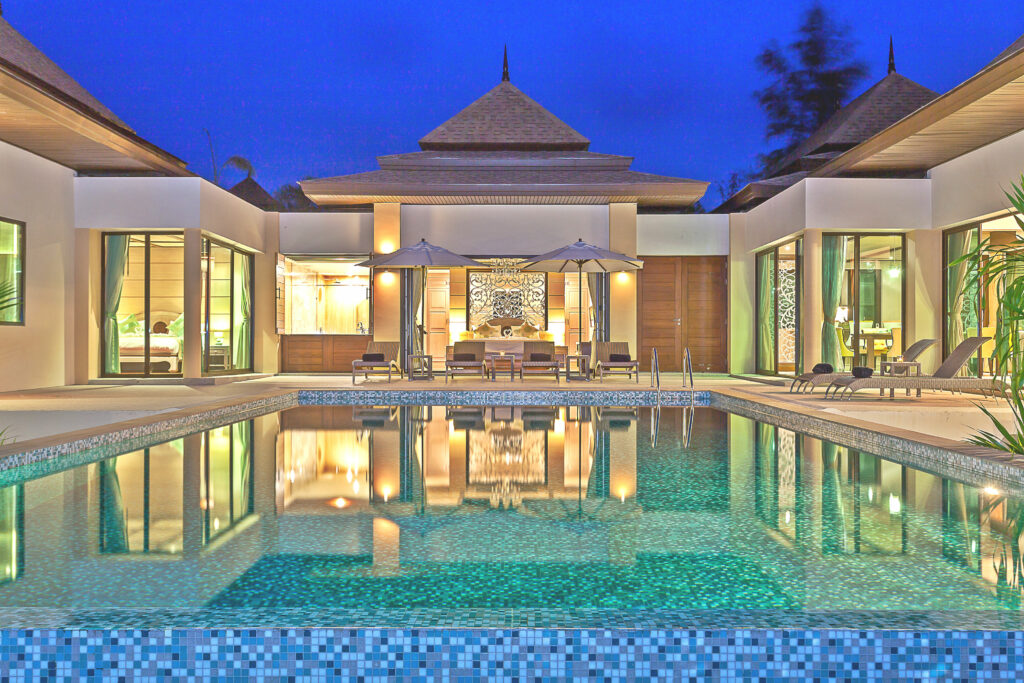 Our private pool villa overlooking the ocean and tropical greenery of Thailand